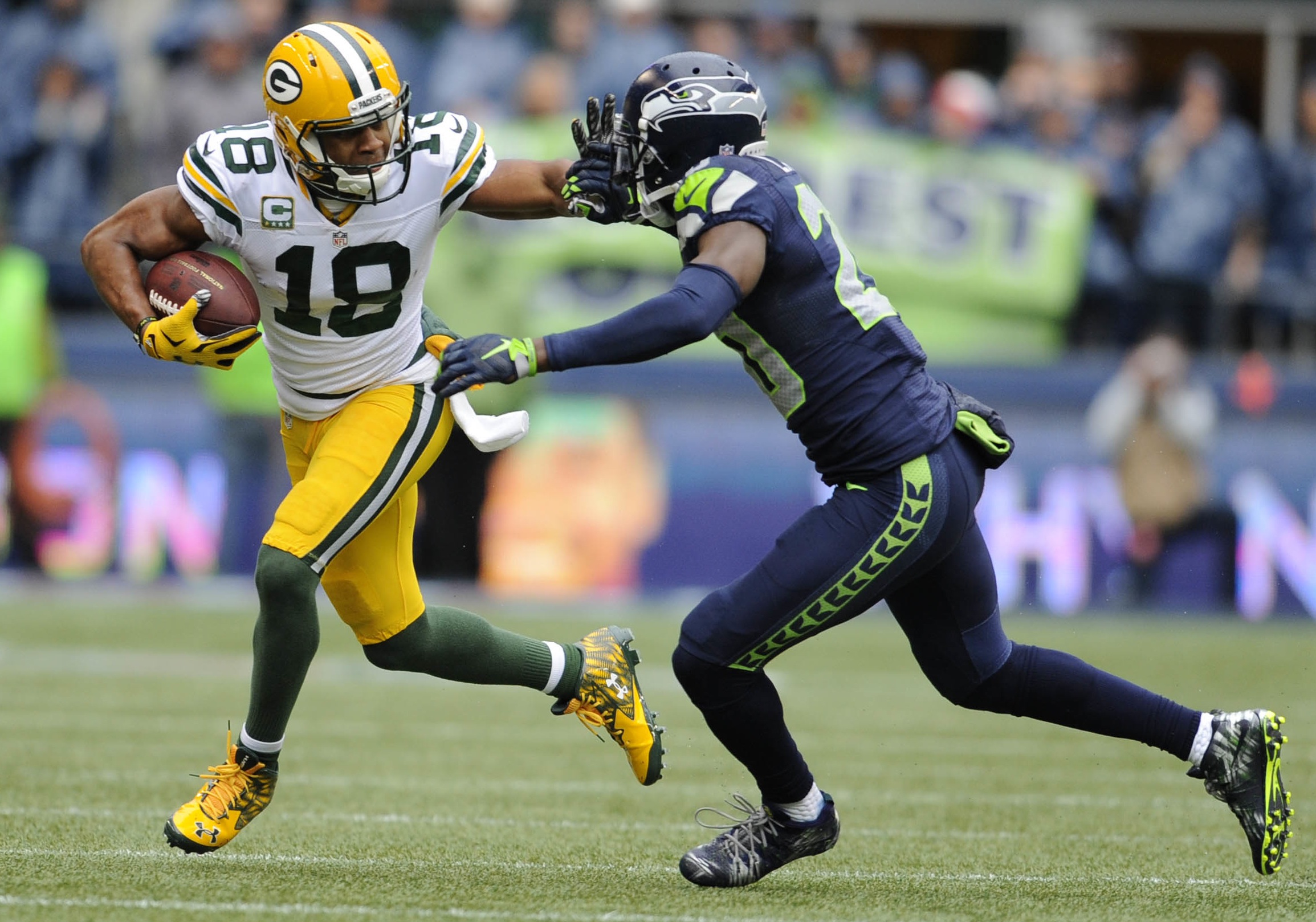 Green Bay Packers wide receiver Randall Cobb and Seattle Seahawks cornerback Jeremy Lane—Steven Bisig, USA TODAY Sports.