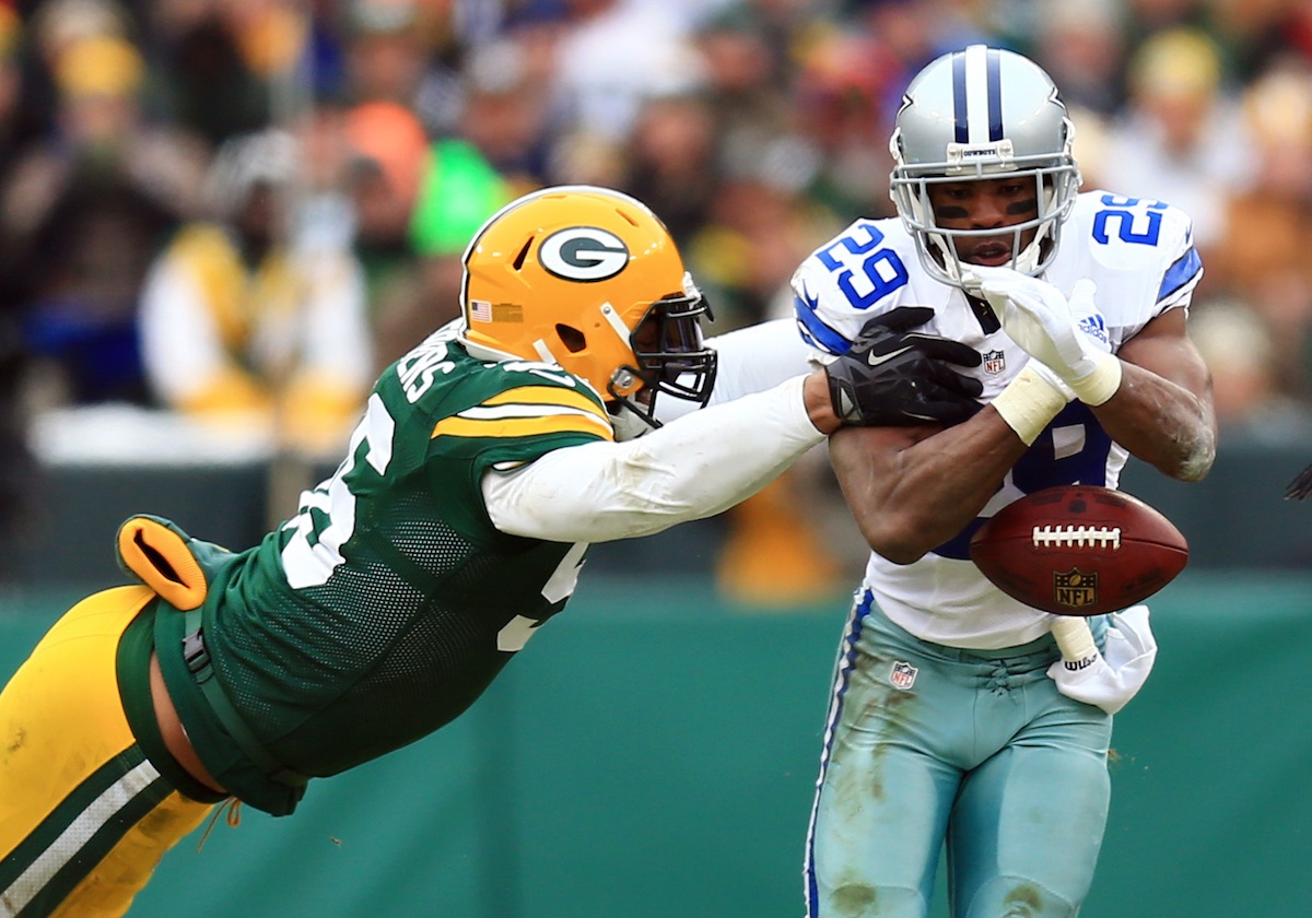 Packers linebacker Julius Peppers forces a fumble by Cowboys running back DeMarco Murray—Andrew Weber, USA TODAY Sports.