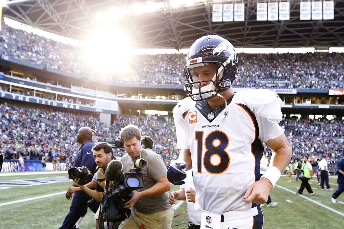 Denver Broncos quarterback Peyton Manning by Joe Nicholson—USA TODAY Sports.